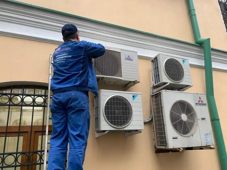 technician-servicing-outdoor-hvac-units
