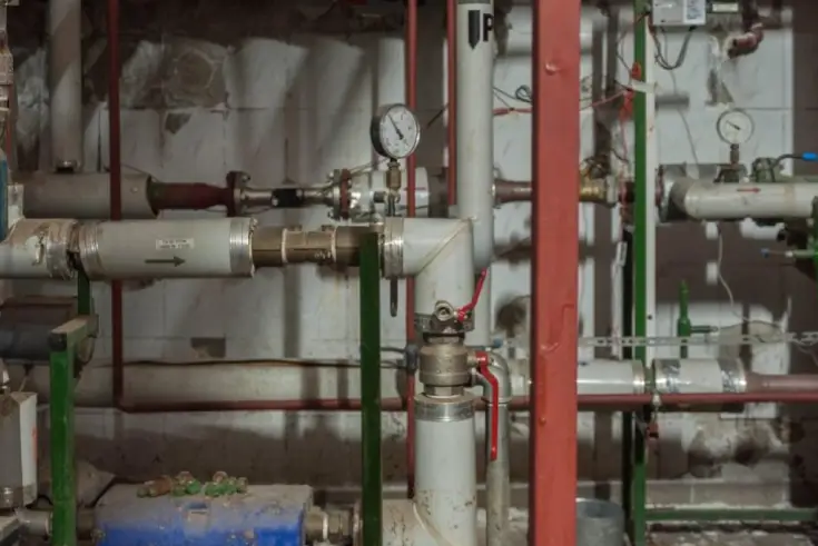 worker-maintaining-factory-pipeline-system