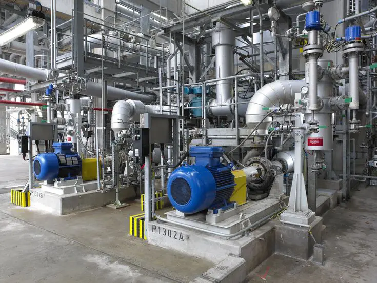 technician-checking-electrical-control-panel-in-industrial-site